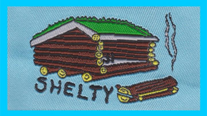 Billede af shelty-mærket man han få ved at sove i shelter 12 gange igennem et helt år
